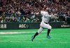 Seattle Mariners' Ichiro Suzuki heads to first as he grounds out in the fourth inning of a pre-season exhibition baseball game against the Yomiuri Giants at Tokyo Dome in Tokyo Sunday, March 17, 2019. (AP Photo/Eugene Hoshiko)