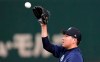 Seattle Mariners pitcher Yusei Kikuchi catches a ball during his team's practice at Tokyo Dome in Tokyo, Saturday, March 16, 2019. Just as he was adjusting to life in the United States, Kikuchi is back in Japan getting ready to make his Major League pitching debut in front of a sellout crowd at Tokyo Dome. Kikuchi will be on the mound in Game 2 of the MarinersvÖf season-opening series in Japan. (AP Photo/Eugene Hoshiko)
