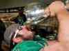 Frank Gunn / Canadian Press files
Dominic Picard drank from the Grey Cup with the Saskatchewan Roughriders  after they beat the Hamilton Tiger-Cats in 2013 in Regina.