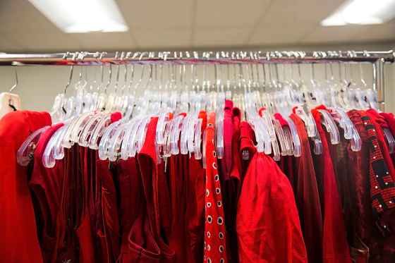 MIKAELA MACKENZIE / WINNIPEG FREE PRESSSome of the 350 red dresses that will be hung Thursday in every window of the building at 717 Portage Avenue.