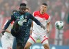 Duesseldorf's Alfredo Morales, right, and Cologne's Kingsley Schindler, left, challenge for the ball during the German Bundesliga soccer match between Fortuna Duesseldorf and 1.FC Cologne in Duessledorf, Germany, Sunday, Nov. 3, 2019. (Roland Weihrauch/dpa via AP)