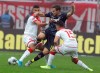 Duesseldorf's Alfredo Morales, left, and Erik Thommy, right, challenge for the ball with Cologne's Louis Schaub, center, during the German Bundesliga soccer match between Fortuna Duesseldorf and 1.FC Cologne in Duessledorf, Germany, Sunday, Nov. 3, 2019. (Roland Weihrauch/dpa via AP)