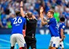 FILE -- In this Saturday, Aug. 24, 2019 photo Schalke's Guido Burgstaller, right, complains to referee Marco Fritz during the German Bundesliga soccer match between FC Schalke 04 and Bayern Munich in Gelsenkirchen, Germany. Newly implemented handball rules are stoking renewed criticism for the video assistant referee in the Bundesliga. (AP Photo/Martin Meissner, file)