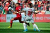 Leverkusen's Charles Aranguiz, left, and Union's Robert Andrich, front, challenge for the ball during the German Bundesliga soccer match between Bayer 04 Leverkusen and 1.FC Union Berlin in Leverkusen, Germany, Saturday, Sept. 21, 2019. (Federico Gambarini/dpa via AP)