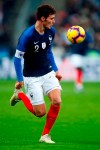 FILE -- In this Tuesday, Nov. 20, 2018 photo France's Benjamin Pavard controls the ball during the international friendly soccer match between France and Uruguay at the Stade de France stadium in Saint-Denis, outside Paris. German Bundesliga soccer team FC Bayern Munich has signed France defender Benjamin Pavard from Bundesliga rival Stuttgart for next season. (AP Photo/Christophe Ena)