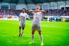 Bayern's Robert Lewandowski, front, celebrates after scoring his side's third goal during the German Bundesliga soccer match between SC Paderborn 07 and FC Bayern Munich in Paderborn, Germany, Saturday, Sept. 28, 2019. (David Inderlied/dpa via AP)