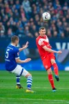 Duesseldorf's Oliver Fink, right, and Schalke's Matija Nastasic, left, challenge for the ball during the German Bundesliga soccer match between FC Schalke 04 and Fortuna Duesseldorf in Gelsenkirchen, Germany, Saturday, March 2, 2019. (Guido Kirchner/dpa via AP)
