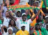 Senegal fans cheer before the African Cup of Nations semifinal soccer match between Senegal and Tunisia in 30 June stadium in Cairo, Egypt, Sunday, July 14, 2019. (AP Photo/Hassan Ammar)