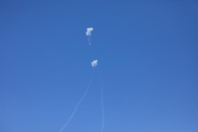 Israeli air defense system Iron Dome takes out rockets fired from Gaza near the town of Ashkelon, Saturday, May 4, 2019. Palestinian militants in the Gaza Strip fired at least 90 rockets into southern Israel on Saturday, according to the Israeli military, triggering retaliatory airstrikes and tank fire against militant targets in the blockaded enclave and shattering a month-long lull in violence. (AP Photo/Tsafrir Abayov)