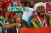 South African fans cheer before the African Cup of Nations round of 16 soccer match between Egypt and South Africa in Cairo International stadium in Cairo, Egypt, Saturday, July 6, 2019. (AP Photo/Ariel Schalit)
