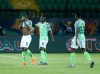 Nigeria's Odin Ighalo, left, leaves the pitch because of an injury during the African Cup of Nations third place soccer match between Tunisia and Nigeria in Al Salam stadium in Cairo, Egypt, Wednesday, July 17, 2019. (AP Photo/Ariel Schalit)