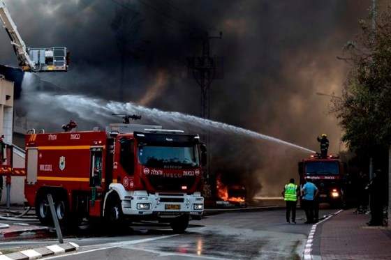 Tsafrir Abayov / The Associated Press FilesFirefighters deploy after a factory hit by a rocket caught fire in Sderot, southern Israel , Israel, Tuesday, Nov. 12m 2019. Israel has killed a senior Islamic Jihad commander in Gaza in a rare targeted killing that threatened to unleash a fierce round of cross-border violence with Palestinian militants. (AP Photo/Tsafrir Abayov)