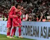 Bahrain's players ce;berate after they have scored during the AFC Asian Cup group A soccer match between the United Arab Emirates and Bahrain at Zayed Sport City in Abu Dhabi, United Arab Emirates, Saturday, Jan. 5, 2019. (AP Photo/Nariman El-Mofty)