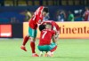 Moroccan players comfort each other after the African Cup of Nations round of 16 soccer match between Morocco and Benin in Al Salam stadium in Cairo, Egypt, Friday, July 5, 2019. (AP Photo/Ariel Schalit)