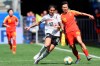 Germany's Dzsenifer Marozsan, left, and China's Zhang Rui fight for the ball during the Women's World Cup Group B soccer match between Germany and China, at the Roazhon Park stadium, in Rennes, France, Saturday, June 8, 2019. (AP Photo/David Vincent)
