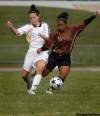 Ruth Bonneville / Winnipeg Free Press Archives
Desiree Scott (right), seen here in 2009 playing for the University of Manitoba Bison Women's Soccer Team, will play for Canada in the 2011 FIFA Women's World Cup.