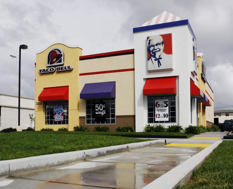 Reed Saxon / The Associated Press
A combined KFC and Taco Bell restaurant in Los Angeles. Hi-Flyer Food (Canada) Inc. has been awarded the franchise rights for 57 KFC and KFC/Taco Bell restaurants.