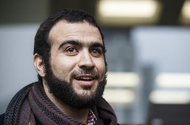 Former Guantanamo Bay prisoner Omar Khadr leaves court in Edmonton on Monday March 25, 2019. A judge ruled Monday that Omar Khadr has completed his sentence. THE CANADIAN PRESS/Jason Franson