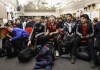 Students at St. Nicholas Catholic Junior High School watch the FC Bayern Munich vs TSG 1899 Hoffenheim on tv in Edmonton, Alta., on Friday January 18, 2019. Former Nicholas Catholic Junior High student, Alphonso Davies joined Bayern Munich in the new year, following a $22-million transfer from the Vancouver Whitecaps. THE CANADIAN PRESS/Jason Franson