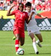 Canada's Kadeisha Buchanan (3) and China's Wang Shanshan (9) battle for the ball during FIFA Women's World Cup action in Edmonton, Alta., on Saturday June 6, 2015. It's early days yet but teenage defender Buchanan is thriving at the Women's World Cup. THE CANADIAN PRESS/Jason Franson