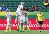 The United States celebrates a goal as Colombia's Natalia Gaitan (3) walks past during second half FIFA Women's World Cup round of 16 soccer action in Edmonton, Alta., on Monday June 22, 2015. THE CANADIAN PRESS/Jason Franson