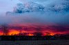 A wildfire moves towards the town of Anzac from Fort McMurray, Alta., on Wednesday May 4, 2016. The wildfire has already torched 1,600 structures in the evacuated oil hub of Fort McMurray and is poised to renew its attack in another day of scorching heat and strong winds.THE CANADIAN PRESS/Jason Franson