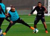 Chile's soccer player Arturo Vidal controls the ball next to Jean Beausejour during a training session in Santiago, Chile, Monday, June 3, 2019, ahead of the Copa America in neighboring Brazil. (AP Photo/Esteban Felix)
