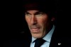 Real Madrid's head coach Zinedine Zidane sits at the bench during the Spanish La Liga soccer match between Real Madrid and Osasuna at the Santiago Bernabeu stadium in Madrid, Spain, Wednesday, Sept. 25, 2019. (AP Photo/Bernat Armangue)