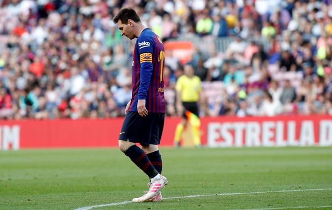 Barcelona forward Lionel Messi walks during the Spanish La Liga soccer match between FC Barcelona and Getafe at the Camp Nou stadium in Barcelona, Spain, Sunday, May 12, 2019. (AP Photo)