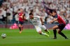 Osasuna's Jon Moncayola fights for the ball against Real Madrid's Casemiro during the Spanish La Liga soccer match between Real Madrid and Osasuna at the Santiago Bernabeu stadium in Madrid, Spain, Wednesday, Sept. 25, 2019. (AP Photo/Bernat Armangue)