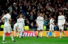 Real Madrid player react as Ajax's Dusan Tadic celebrates scoring his side's 3rd goal, during the Champions League soccer match between Real Madrid and Ajax at the Santiago Bernabeu stadium in Madrid, Spain, Tuesday, March 5, 2019. (AP Photo/Manu Fernandez)