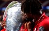 Liverpool's Divock Origi kisses the trophy after winning the Champions League final soccer match between Tottenham Hotspur and Liverpool at the Wanda Metropolitano Stadium in Madrid, Saturday, June 1, 2019. (AP Photo/Manu Fernandez)