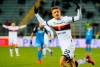 Genoa's Darko Lazovic celebrates after scoring during the Serie A soccer match between Empoli and Genoa at the Carlo Castellani stadium in Empoli, Italy, Monday, Jan. 28, 2019. (Fabio Muzzi/ANSA via AP)