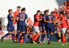 FILE. In this Sept. 1, 2018 file photo PSG's Kylian Mbappe, 2nd right, argues as Nimes' Teji Savanier, left, lies on the pitch during their League One soccer match between Nimes and Paris Saint-Germain at Jean-Bouin stadium in Nimes, southern France. After helping Nimes to promotion last season with four goals and nine assists, Savanier made headlines for the wrong reasons last September following an altercation with Paris Saint-Germain star Kylian MbappÃ© that resulted in a five-match ban. (AP Photo/Claude Paris)