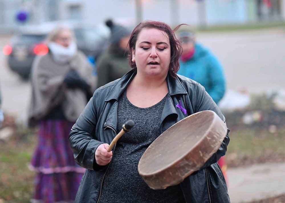 Mike Sudoma / Winnipeg Free Press
Krista Stacey starts Friday evenings End the Silence Stop the Violence walk as she performs the Grandmother’s song.