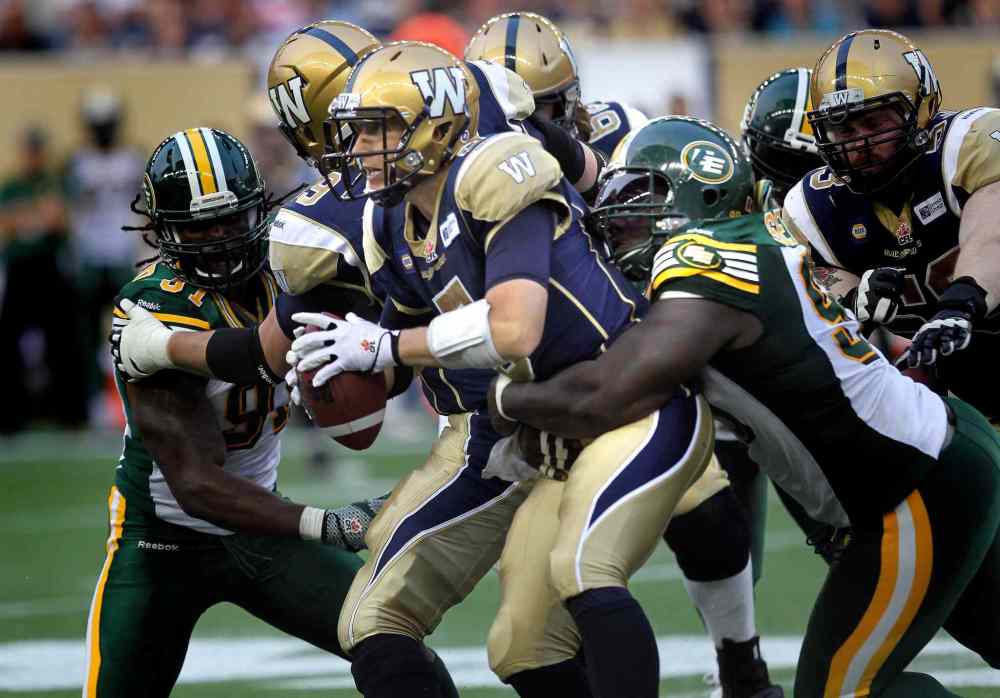 Phil Hossack / Winnipeg Free Press
Winnipeg Blue Bombers quarterback Drew Willy got sacked four times during Thursday's game. That's unacceptable, Gary Lawless writes.