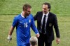 Italy coach Cesare Prandelli talks to Daniele De Rossi after he substituted him during the Euro 2012 soccer championship quarterfinal match between England and Italy in Kiev, Ukraine, Sunday, June 24, 2012. (AP Photo/Vadim Ghirda)