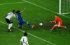 Greece's Giorgos Samaras scores his side's first goal past Germany goalkeeper Manuel Neuer during the Euro 2012 soccer championship quarterfinal match between Germany and Greece in Gdansk, Poland, Friday, June 22, 2012. (AP Photo/Gero Breloer)