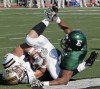 Duane Burleson / Associated Press archives
Western Michigan tight end Matt Stevens, left, catches a one-yard touchdown pass against Eastern Michigan linebacker Andy Mulumba during the first quarter of a NCAA college football game in 2009.