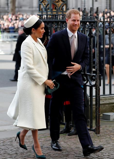 FILE - In this file photo dated Monday, March 11, 2019, Britain's Prince Harry and Meghan Markle, the Duchess of Sussex arrive to attend the Commonwealth Service at Westminster Abbey on Commonwealth Day in London. Prince Harry on Monday May 6, 2019, said Meghan has given birth to a baby boy.(AP Photo/Frank Augstein, FILE)