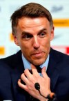 England women's soccer head coach Phil Neville speaks about his 2019 FIFA World Cup squad in a media conference at Wembley stadium in London, Wednesday, May 8, 2019. (AP Photo/Frank Augstein)