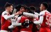 Arsenal's Alexandre Lacazette celebrates with teammates after scoring his side's first goal during the Europa League group E soccer match between Arsenal and Qarabag at Emirates stadium in London, England, Thursday, Dec. 13, 2018. (AP Photo/Frank Augstein)