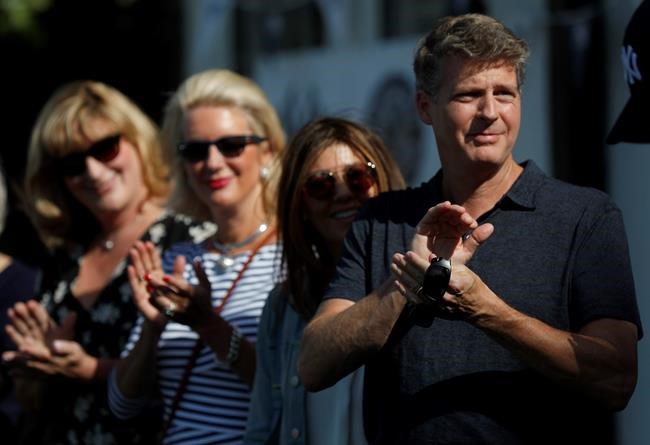 From right, Yankee controlling owner Hal Steinbrenner, his wife Christina DiTullio, Jessica Steinbrenner and Jennifer Steinbrenner Swindal during a private Baseball Clinic in London, Thursday, June 27, 2019. The Yankees are hosting for approximately 100 youth in the London community in conjunction with the London Meteorites Baseball and Softball Club this private Baseball Clinic. (AP Photo/Frank Augstein)