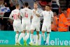 England's Harry Kane, England's Jadon Sancho, right, celebrate with teammates after their side's third goal during the Euro 2020 group A qualifying soccer match between England and Kosovo at St Mary's Stadium in Southampton, England, Tuesday, Sept. 10, 2019 . (AP Photo/Matt Dunham)