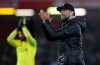 Liverpool's coach Juergen Klopp celebrates after his team won the English Premier League soccer match between Liverpool and Huddersfield Town at Anfield Stadium, in Liverpool, England, Friday, April 26, 2019.(AP Photo/Jon Super)