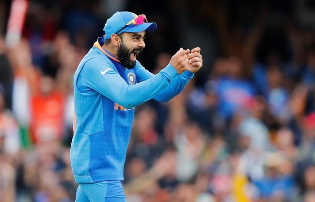 India's captain Virat Kohli celebrates after winning the Cricket World Cup match between India and Australia at the Oval in London, Sunday, June 9, 2019.(AP Photo/Frank Augstein)