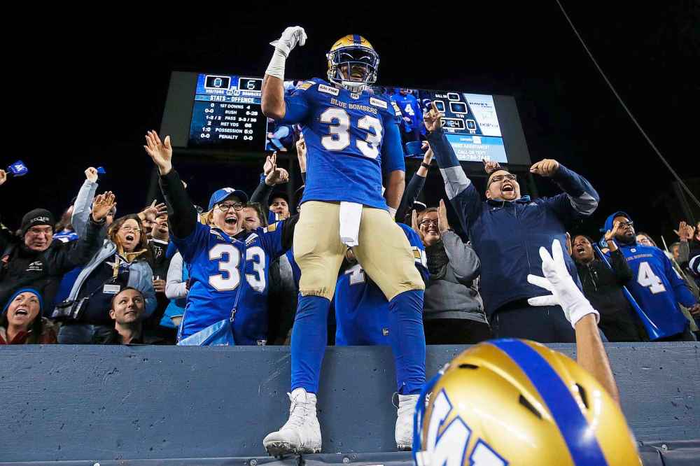 JOHN WOODS / THE CANADIAN PRESS FILES 
Bombers running back Andrew Harris celebrates a first-quarter touchdown against the Hamilton Tiger-Cats Sept. 27. It's the last TD the Bombers have scored.