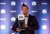 THE CANADIAN PRESS/Jason Franson
Winner of Most Outstanding Defensive Player, Winnipeg Blue Bombers' Adam Bighill, holds his award, during the Shaw CFL Awards in Edmonton on Thursday.