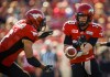 Jeff McIntosh / The Canadian Press
Calgary QB Bo Levi Mitchell (right) will be without star running back Jon Cornish tonight, but the Stamps still have a formidable running game.