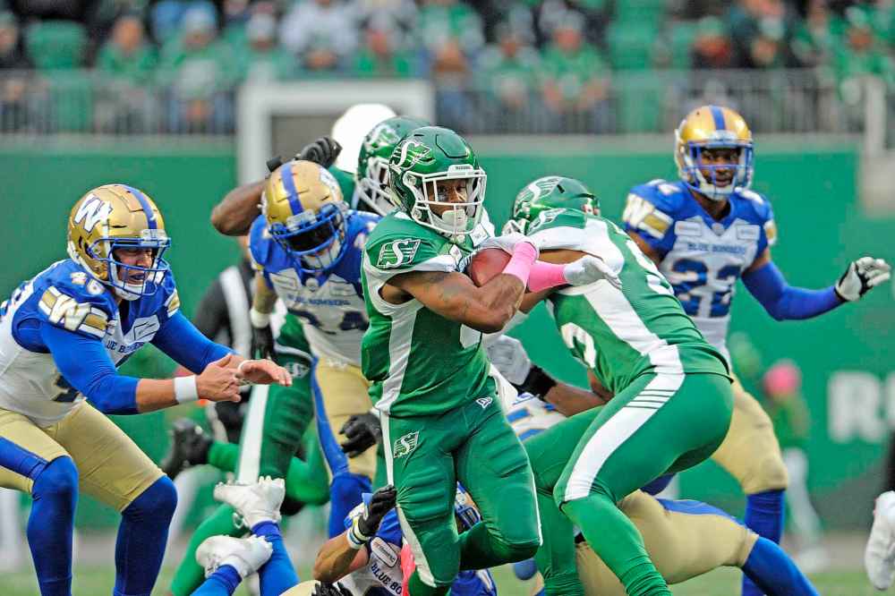 MARK TAYLOR / THE CANADIAN PRESS
Saskatchewan Roughriders punter running back Marcus Thigpen returns a punt during first half CFL action against the Winnipeg Blue Bombers, in Regina on Saturday, Oct. 5, 2019.